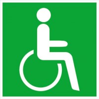 Emergency exit sign for wheelchair users